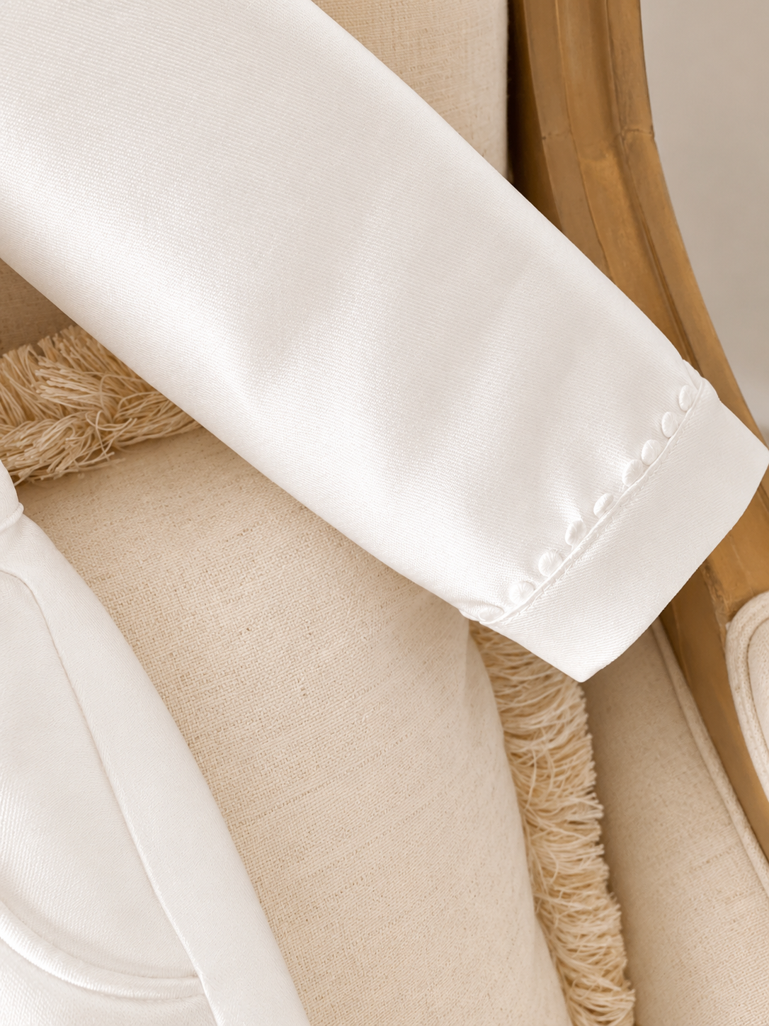 A timeless two piece set designed for baptisms, christenings and special occasions. Crafted in luxurious mikado, this classic ensemble pairs a beautifully tailored long sleeve shirt with coordinating tailored trousers and suspenders. 